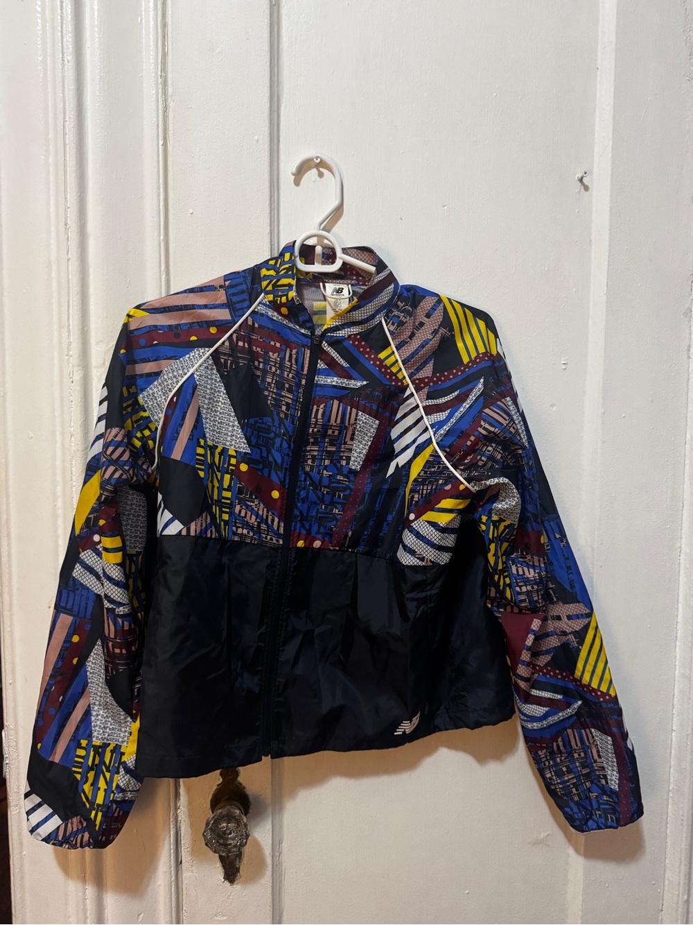 New Balance Black Windbreaker Jacket with Multicolor Geometric Print